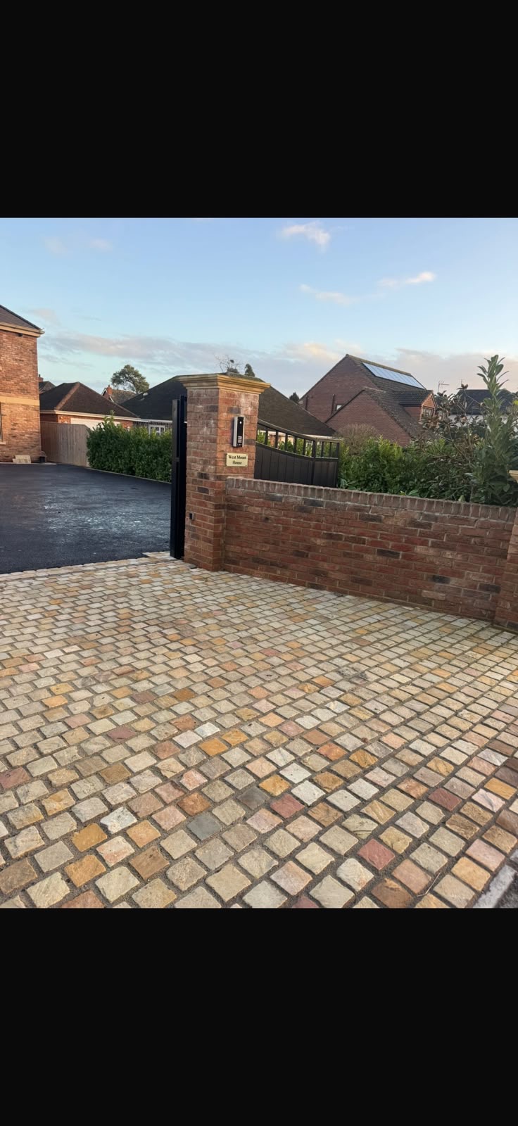 Natural cobble driveway after installation by H Driveways